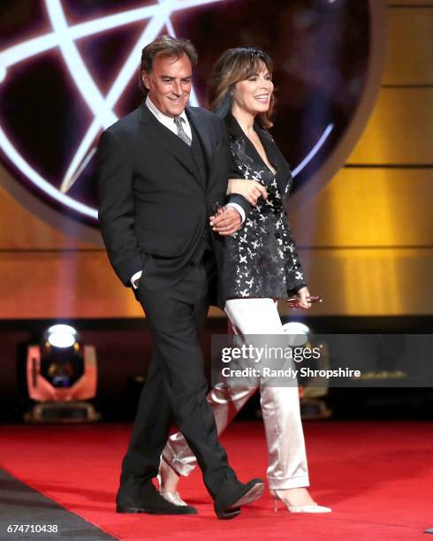 Presenters Thaao Penghlis and Lauren Koslow attend the 44th annual daytime creative arts Emmy awards show at Pasadena Civic Auditorium on April 28,...
