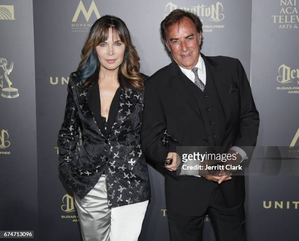 Lauren Koslow and Thaao Penghlis attend the 44th Annual Daytime Creative Arts Emmy Awards - Press Room at Pasadena Civic Auditorium on April 28, 2017...