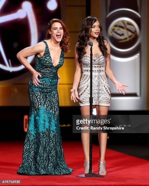 Presenters Courtney Hope and Reign Edwards attend the 44th annual daytime creative arts Emmy awards show at Pasadena Civic Auditorium on April 28,...