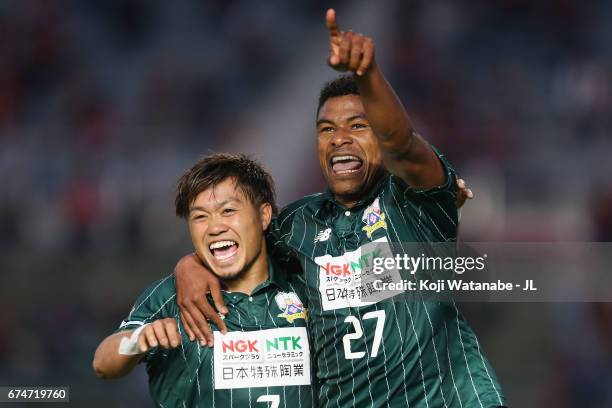 Henik of FC Gifu celebrates scoring the opening goal with his team mate Paulo Junichi Tanaka during the J.League J2 match between FC Gifu and Zweigen...