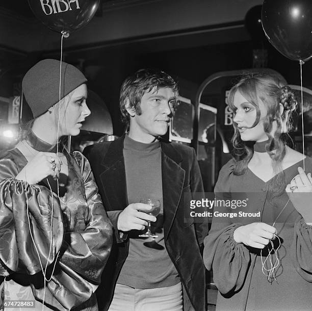 Return to the 1920s look during a champagne tea party at the Biba boutique, London, UK, 25th October 1970. From left to right, Shelley Lambert, actor...