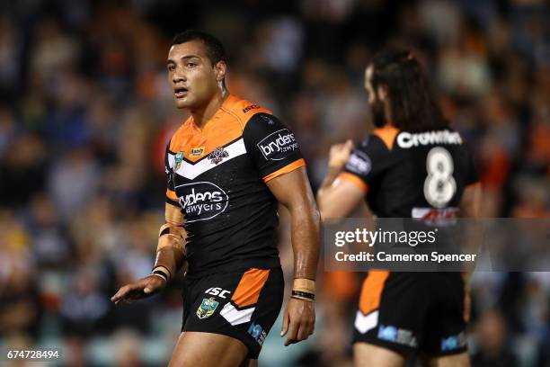 Avagalu Seumanufagai of the Tigers signals to team mates during the round nine NRL match between the Wests Tigers and the Cronulla Sharks at...