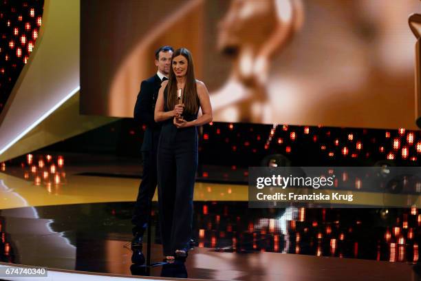 Producer Janine Jackowski speaks on stage after the film Toni Erdmann received the Golden Award for Best Film at the Lola - German Film Award show at...