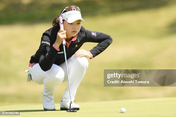 Yuting Seki of China lines up her putt on the 1st green during the second round of the CyberAgent Ladies Golf Tournament at the Grand Fields Country...