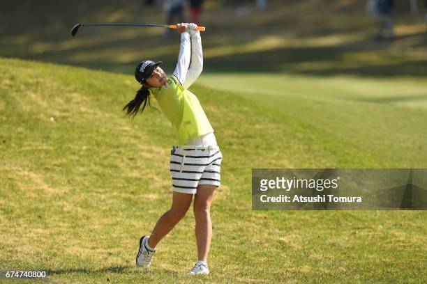 Rie Tsuji of Japan hits her second shot on the 1st hole during the second round of the CyberAgent Ladies Golf Tournament at the Grand Fields Country...