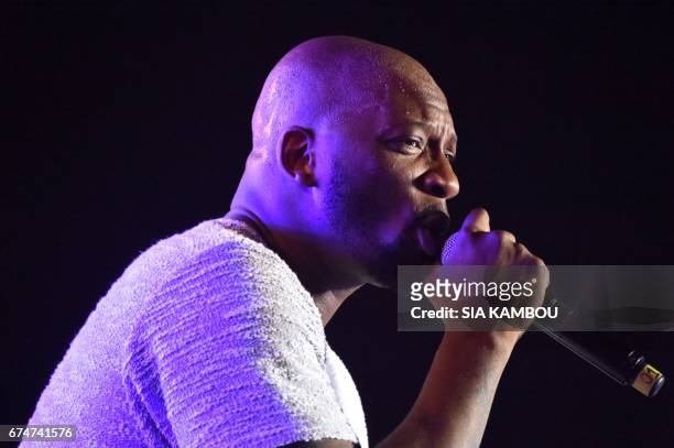 French singer Bedaya N'Garo Singuila aka Singuila , performs at the Festival des Musiques Urbaines d'Anoumabo on APril 29 at the Papa Wemba square in...
