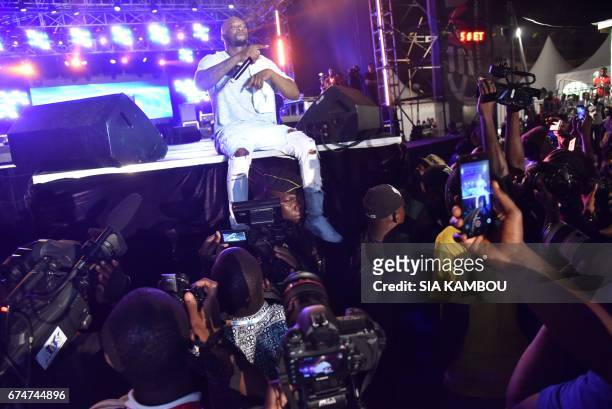 French singer Bedaya N'Garo Singuila aka Singuila, performs at the Festival des Musiques Urbaines d'Anoumabo on APril 29 at the Papa Wemba square in...