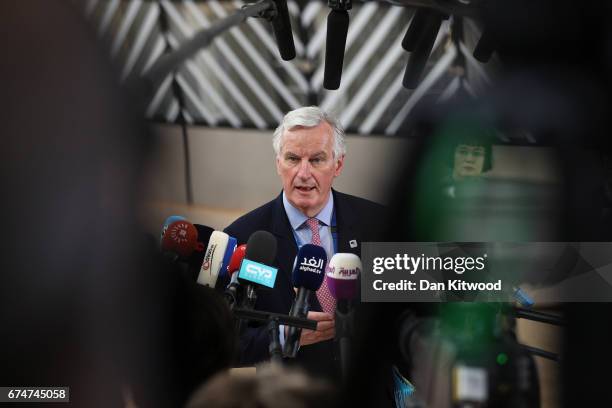 European Union's chief Brexit negotiator, Michel Barnier speaks to the media as he arrives at the Council of the European Union ahead of an EU...