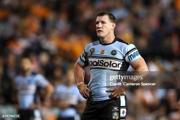 Paul Gallen of the Sharks looks on during the round nine NRL match between the Wests Tigers and the Cronulla Sharks at Leichhardt Oval on April 29,...