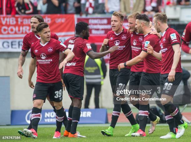 Team of Nuernberg celebrate the first goal against Stuttgart during the Second Bundesliga match between 1. FC Nuernberg and VfB Stuttgart at Arena...