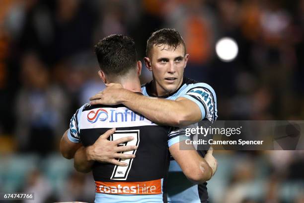 Chad Townsend and Kurt Capewell of the Sharks embrace after winning the round nine NRL match between the Wests Tigers and the Cronulla Sharks at...