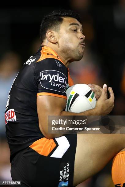 David Nofoaluma of the Tigers takes a high ball during the round nine NRL match between the Wests Tigers and the Cronulla Sharks at Leichhardt Oval...