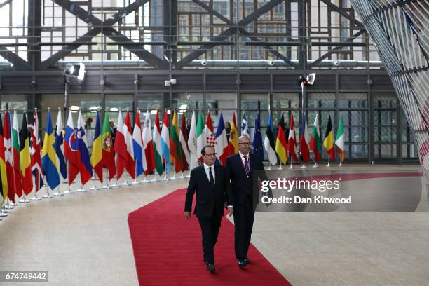 French President Francois Hollande arrives at the Council of the European Union ahead of an EU Council meeting on April 29, 2017 in Brussels,...