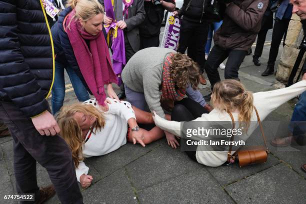 Independence Party member scuffles on the floor with a pro-EU supporter outside a pub in Hartlepool ahead of a visit by UKIP leader Paul Nuttall on...