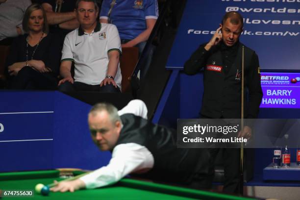 Barry Hawkins of England reacts during the semi-final match against John Higgins of Scotland on day fifteen of Betfred World Championship 2017 at...