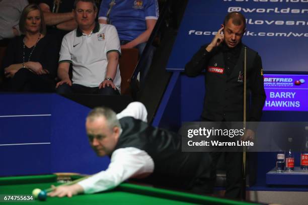 Barry Hawkins of England reacts during the semi-final match against John Higgins of Scotland on day fifteen of Betfred World Championship 2017 at...