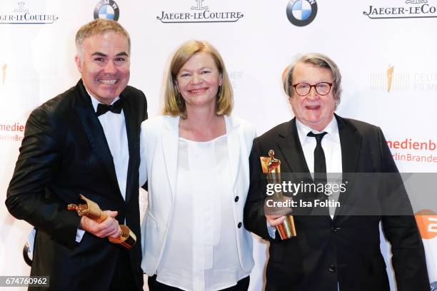 Award winner best documentary film StefanTolz, Heidi Specogna and Peter Spoerri at the Lola - German Film Award winners board at Messe Berlin on...