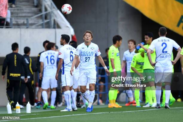 Kazuaki Mawatari of Tokushima Vortis is sent off after throwing the ball and pushing a ball boy during the J.League J2 match between JEF United Chiba...