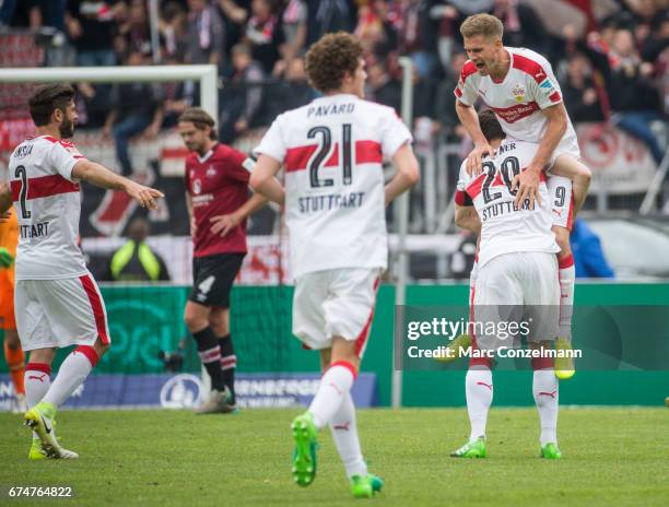 Simon Terodde of Stuttgart celebrates their triumphwith his team-mates after the Second Bundesliga match between 1. FC Nuernberg and VfB Stuttgart at...