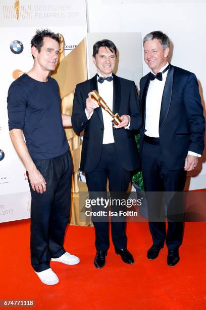 Tom Tykwer and award winners at the Lola - German Film Award winners board at Messe Berlin on April 28, 2017 in Berlin, Germany.