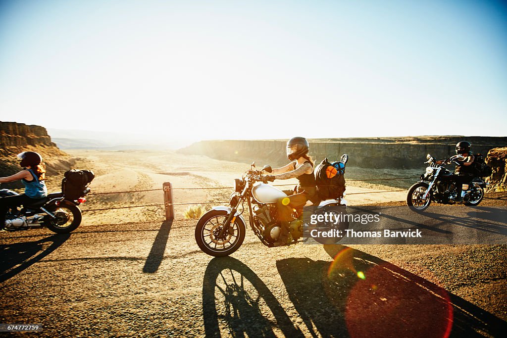 Motorcycle Entourage Group Of Friends On Motorcycle Road Trip In Desert High-Res Stock Photo ...