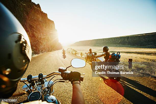 group of female friends on motorcycle road trip - biker fotografías e imágenes de stock