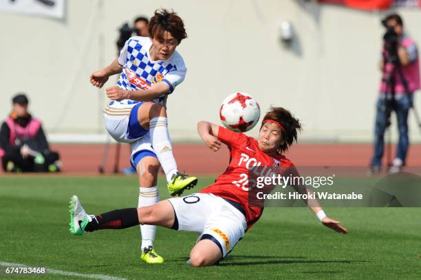 Yuki Sakai of Mynavi Vegalta Sendai Ladies and Chika Kato of Urawa Red Diamonds Ladies compete for the ball during the Nadeshiko League match between...