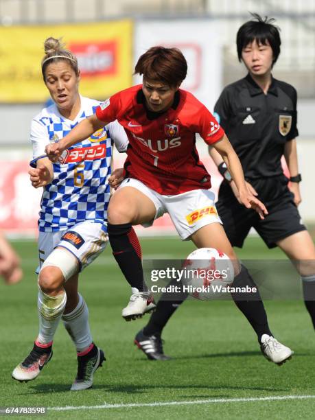 Katrina Gorry of Mynavi Vegalta Sendai Ladies and Risa Ikadai of Urawa Red Diamonds Ladies compete for the ball during the Nadeshiko League match...