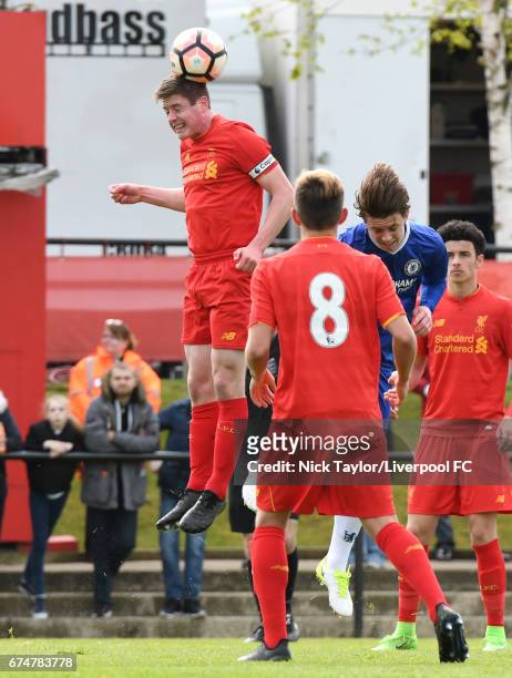 Liam Coyle of Liverpool wins an aerial challenge during the Liverpool v Chelsea U18 Premier League game at The Kirkby Academy on April 29, 2017 in...