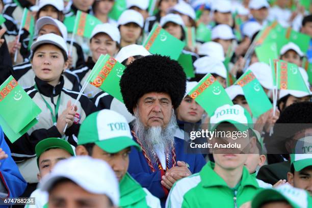 Participants are seen during the opening ceremony of Akhal-Teke Horse Beauty Contest within annual Turkmen Racing Horse Festival in Ashgabat,...