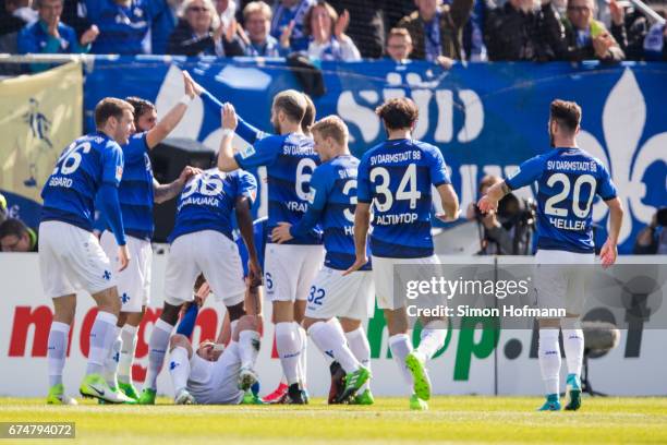 Jerome Gondorf of Darmstadt celebrates his team's second goal with his team mates during the Bundesliga match between SV Darmstadt 98 and SC Freiburg...