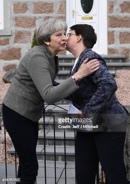 British Prime Minister Theresa May campaigns on the streets with Scottish Conservative leader Ruth Davidson on April 29, 2017 in Banchory, Scotland....