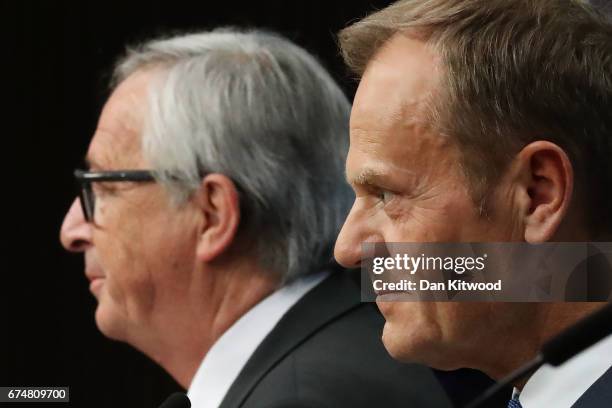 President of the European Council Donald Tusk, and President of the European Commission Jean-Claude Juncker speak during a press conference after an...