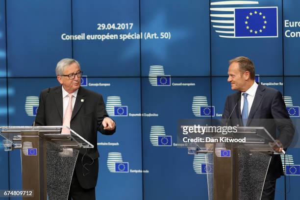 President of the European Council Donald Tusk, and President of the European Commission Jean-Claude Juncker speak during a press conference after an...
