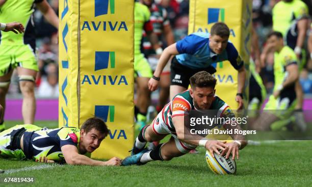 Owen Williams of Leicester dives over for their third try during the Aviva Premiership match between Leicester Tigers and Sale Sharks at Welford Road...