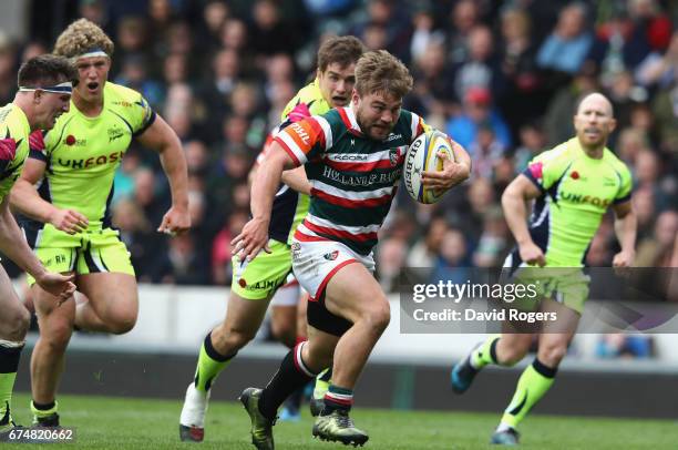 Jack Roberts of Leicester breaks clear to score their fourth try during the Aviva Premiership match between Leicester Tigers and Sale Sharks at...