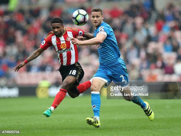 Simon Francis of AFC Bournemouth and Jermain Defoe of Sunderland clash during the Premier League match between Sunderland and AFC Bournemouth at the...
