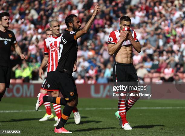 Dusan Tadic of Southampton reacts after failing to score from the penalty spot during the Premier League match between Southampton and Hull City at...