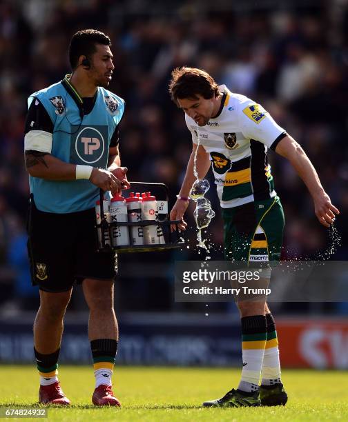 Lee Dickson of Northampton Saints spills his water during the Aviva Premiership match between Exeter Chiefs and Northampton Saints at Sandy Park on...