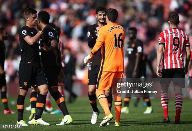 Hull City players celebrate with Eldin Jakupovic of Hull City after the full timw whistle during the Premier League match between Southampton and...