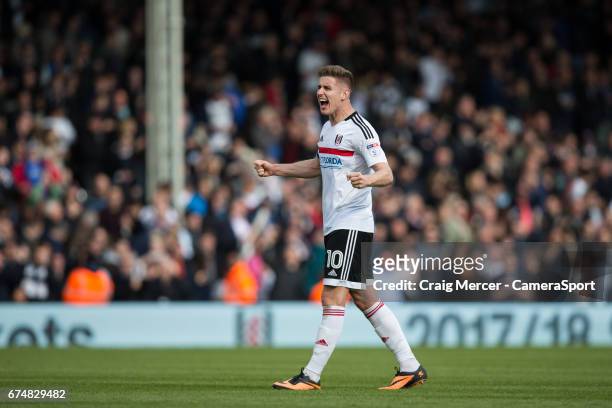 Fulham's Tom Cairney celebrates at full time of the Sky Bet Championship match between Fulham and Brentford at Craven Cottage on April 29, 2017 in...