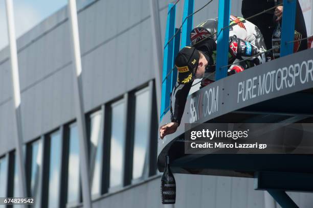 Jonathan Rea of Great Britain and KAWASAKI RACING TEAM celebrates on the podium the victory at the end of the race 1 during the FIM World Superbike...