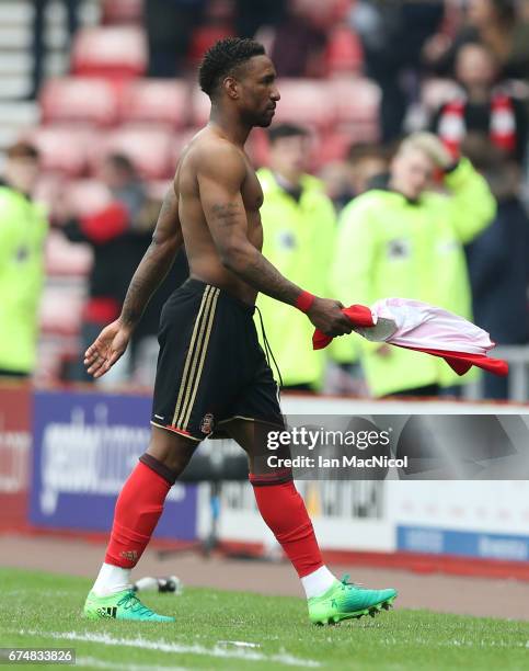 Jermain Defoe of Sunderland looks dejected as he leaves the field with his team relegated after the Premier League match between Sunderland and AFC...