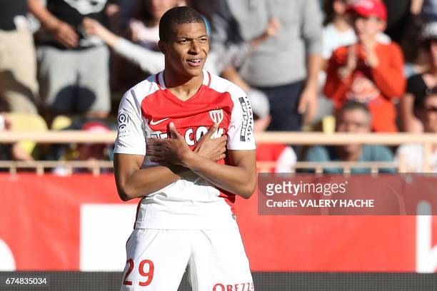 Monaco's French forward Kylian Mbappe Lottin celebrates after scoring a goal during the French L1 football match Monaco vs Toulouse on April 29, 2017...