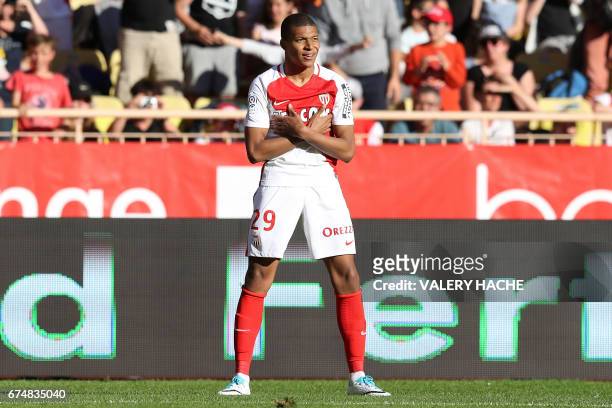 Monaco's French forward Kylian Mbappe Lottin celebrates after scoring a goal during the French L1 football match Monaco vs Toulouse on April 29, 2017...
