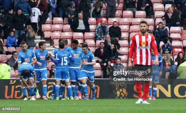 Bournemouth players celebrate the only goal during the Premier League match between Sunderland AFC and AFC Bournemouth at Stadium of Light on April...