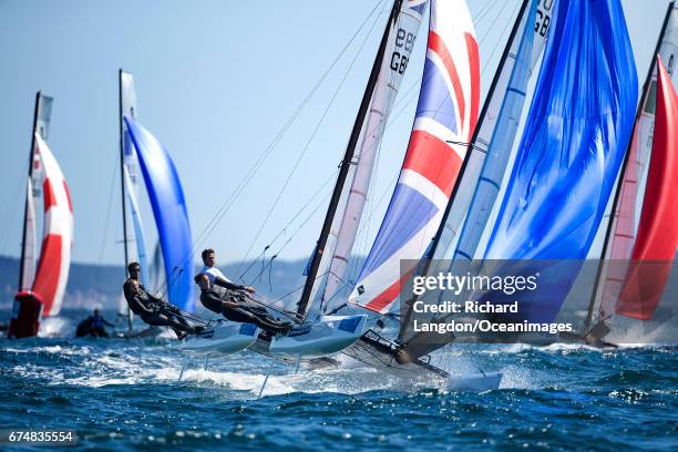 John Gimson and Anna Burnet from the British Sailing Team sail their Nacra 17 during the ISAF Sailing World Cup Hyeres on APRIL 29, 2017 in Hyeres,...