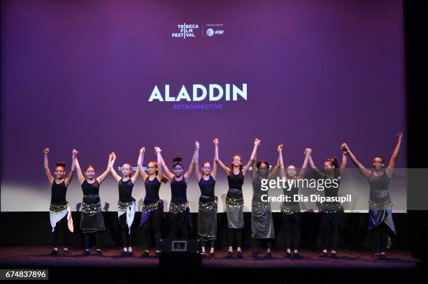 Performers dance onstage before the "Aladdin" screening during the 2017 Tribeca Film Festival at BMCC Tribeca PAC on April 29, 2017 in New York City.
