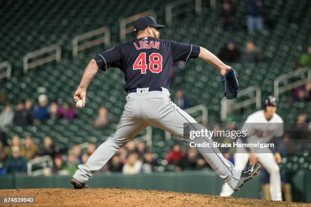 Boone Logan of the Cleveland Indians pitches against the Minnesota Twins on April 18, 2017 at Target Field in Minneapolis, Minnesota. The Indians...