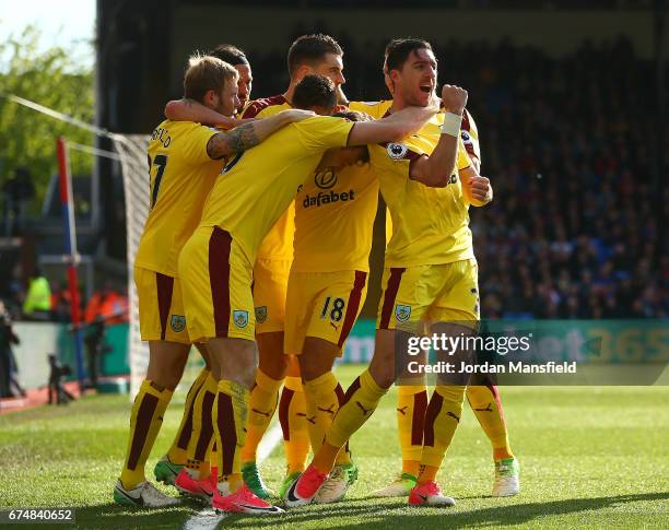 Stephen Ward of Burnley celebrates the opening goal scored by Ashley Barnes during the Premier League match between Crystal Palace and Burnley at...